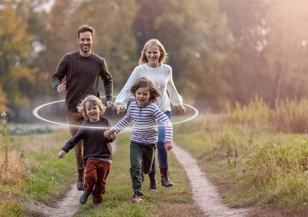 Happy family running together